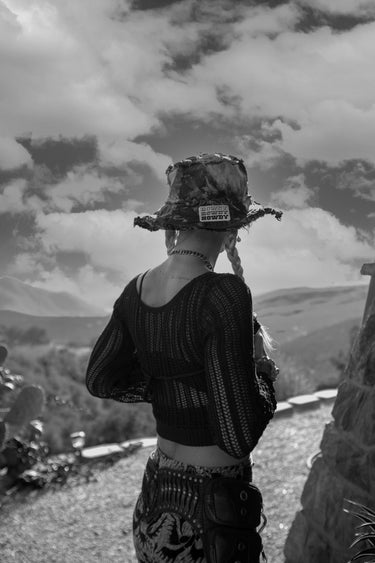 Alyssa Risley Photography | Black and White Portrait of Woman wearing Denim Bucket Hat | Western Boho Style | Festival Fashion | Neon Nomade