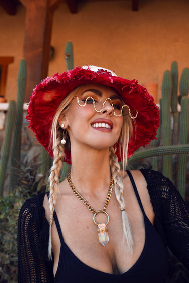 Alyssa Risley Photography | Woman wearing Red Tie Dye Denim Hat with Real Heart Beaded Patch and Crystal Necklace | Festival Fashion | Neon Nomade