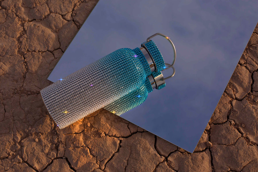 Blue Ice Bling Diamond Ombre Water Bottle with Rhinestones Photographed in the Desert | Available Sizes: 500ML 750ML and 1L Liter Goth Witch Witchcore Whimsigoth Y2K | Neon Diamond and Neon Nomade Festival Rave Fashion and Boujee Gym Accessories