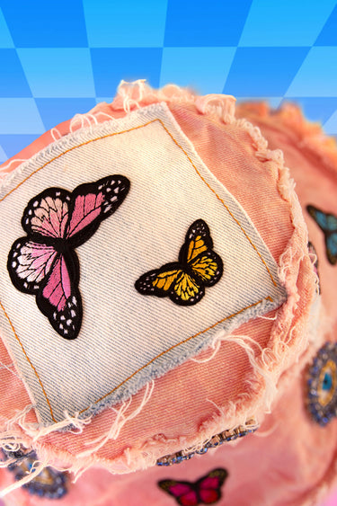Top View of Pink Tie Die Bucket Hat with Butterfly Patches and Frayed Edges | Festival Forestcore Fairy Patchwork Upcycled Rave Fashion | Neon Nomade