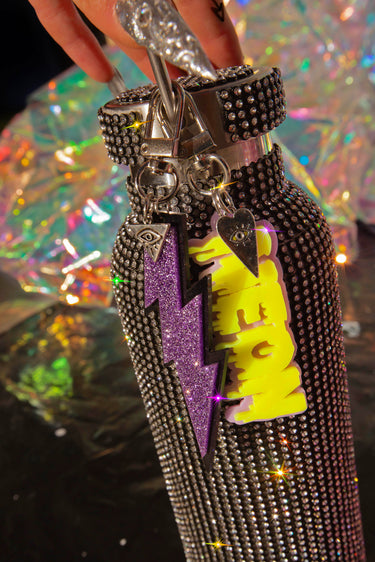 Glitter Purple and Black Lightning Bolt Keychain with Third Eye Evil Eye Charm and Neon Smlie Logo Keychain on Bling Diamond Water Bottle  Goth Witch Witchcore Whimsigoth Y2K | Neon Diamond & Neon Nomade Festival Rave Fashion and Accessories