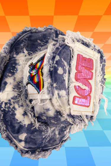 Top View of Trippy Butterfly Hippie Tie Dye Splatter Bleach Denim Bucket Hat with Front Stash Pocket and Sequin Top Love Patch and Frayed Distressed Edges | Handmade Upcycled Festival Rave Fashion | Neon Nomade